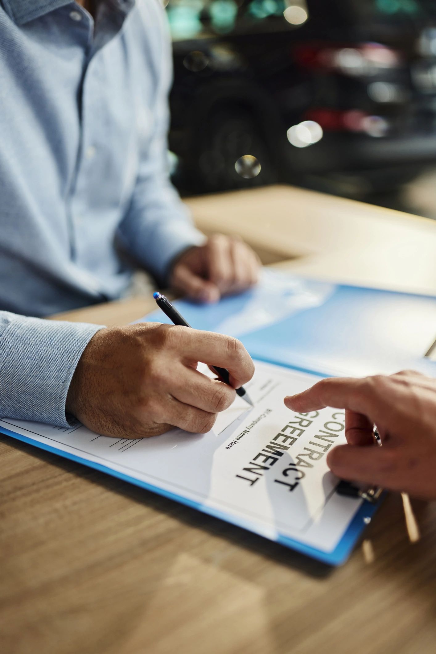 car dealership consulting business meeting