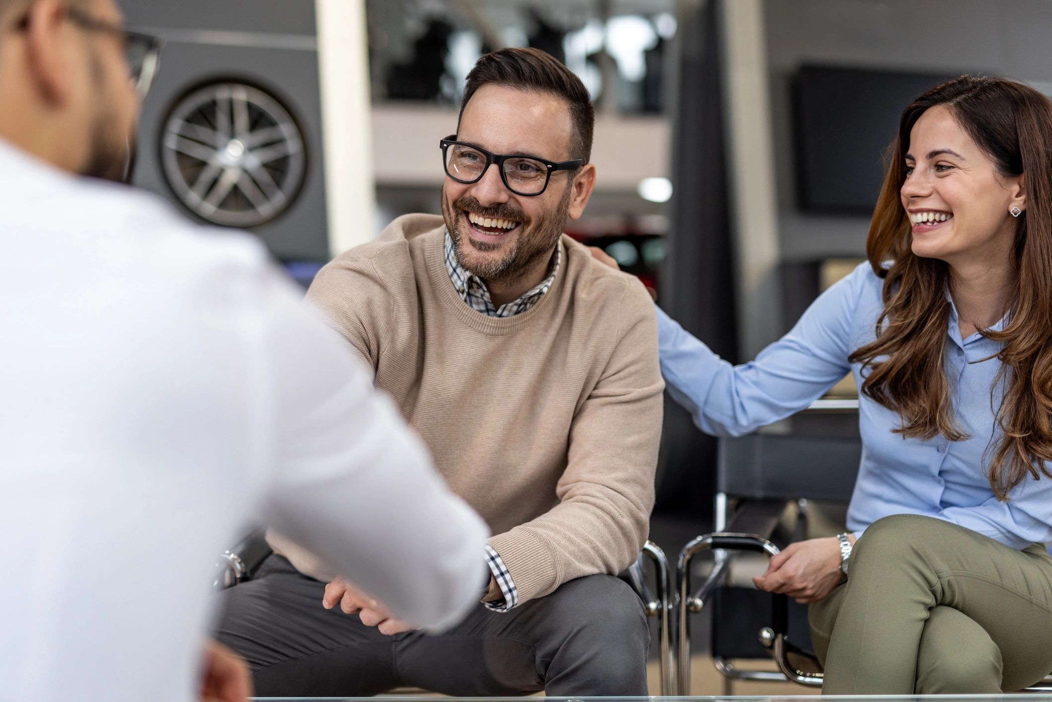 happy client handshake car dealership